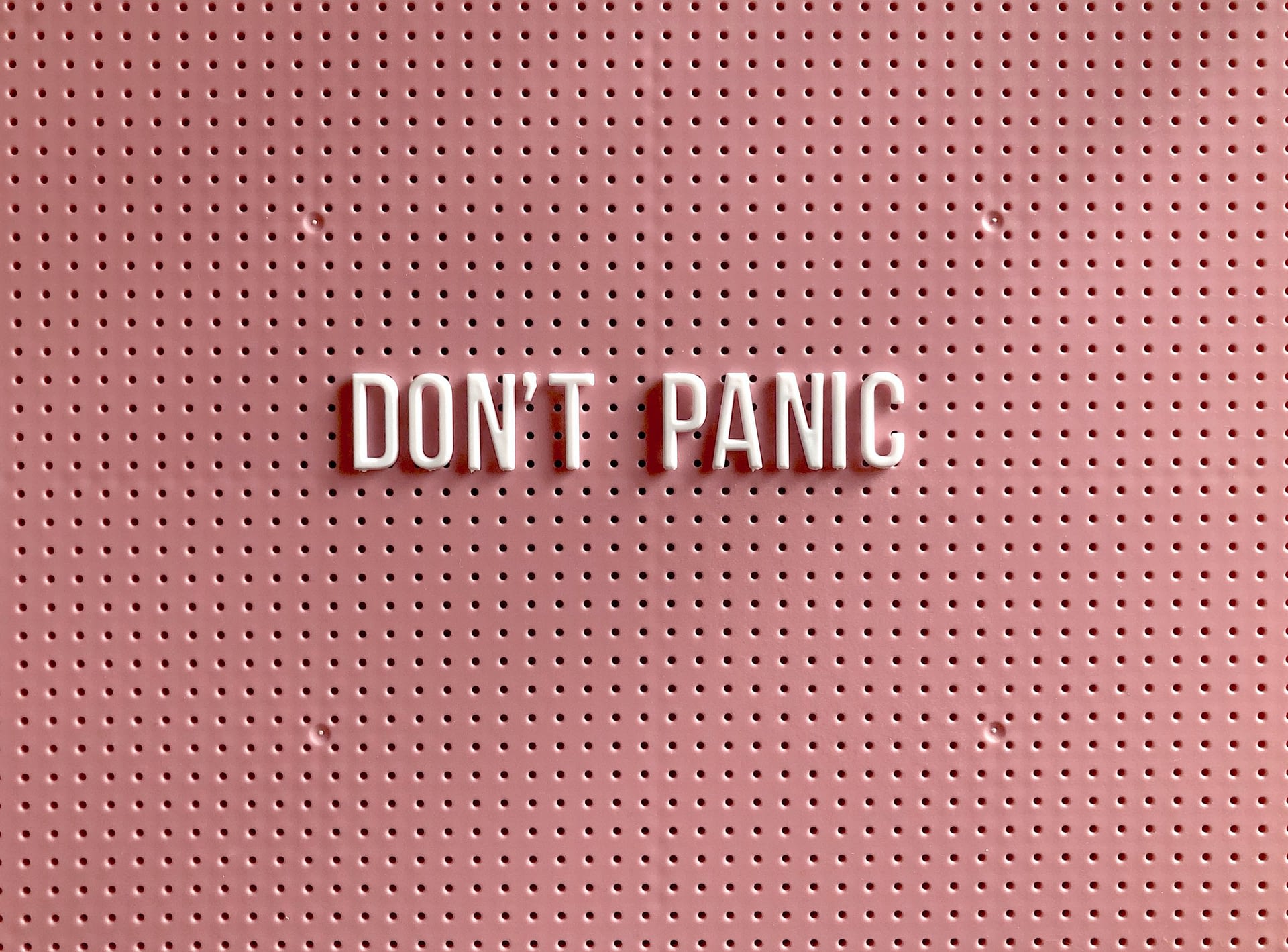 pinboard saying don't panic suggesting anxiety